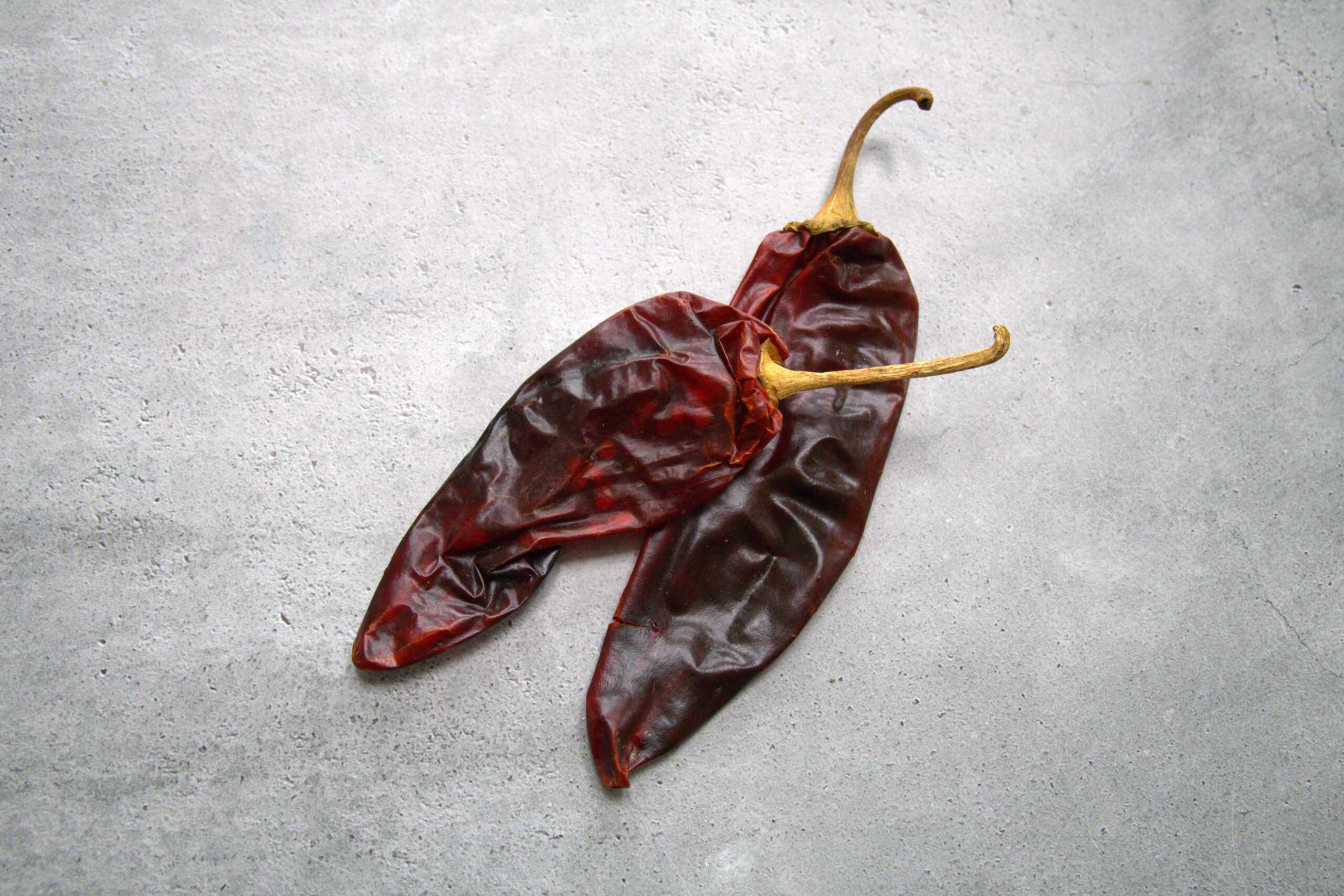 two dried guajillo chilies