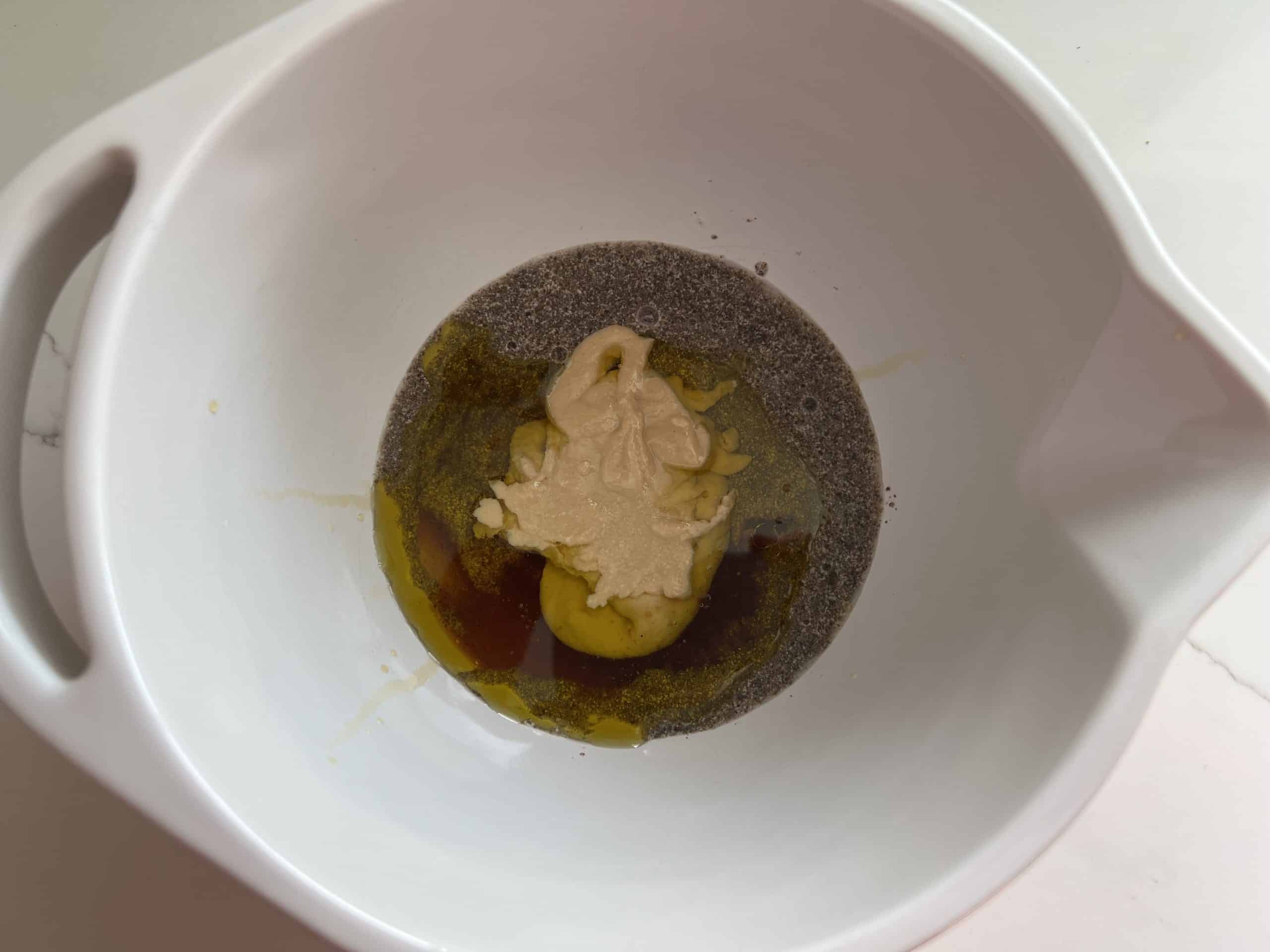 wet ingredients for vegan gluten free chocolate chip cookies in a bowl