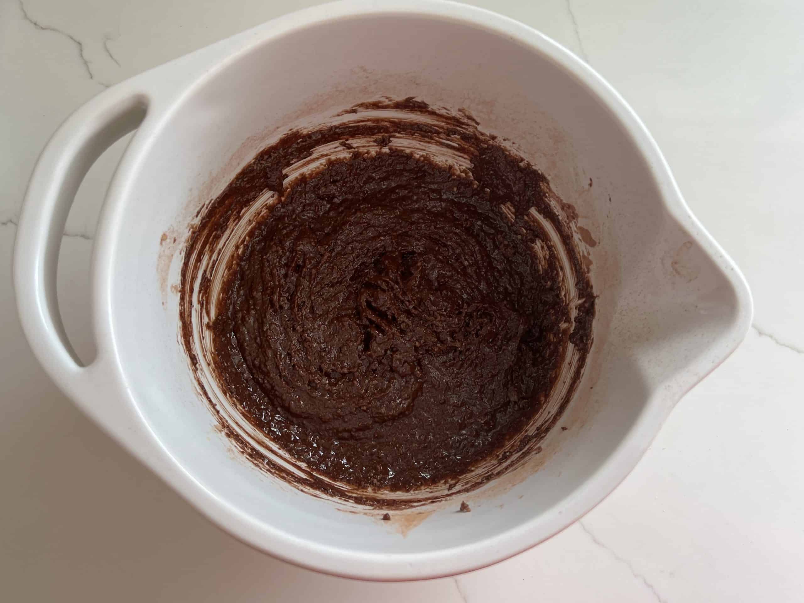vegan gluten free chocolate chip cookie batter in a bowl