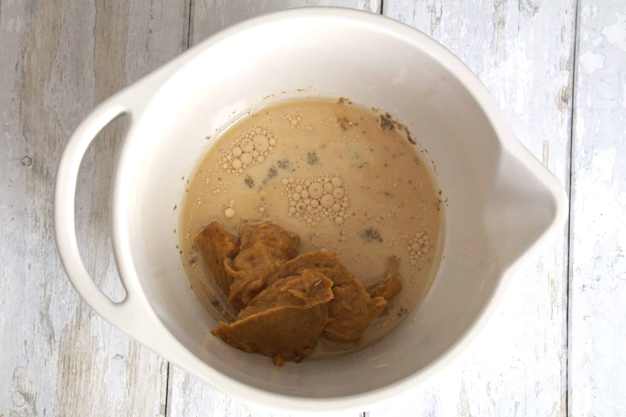 wet ingredients for spiced date chocolate muffins in a bowl