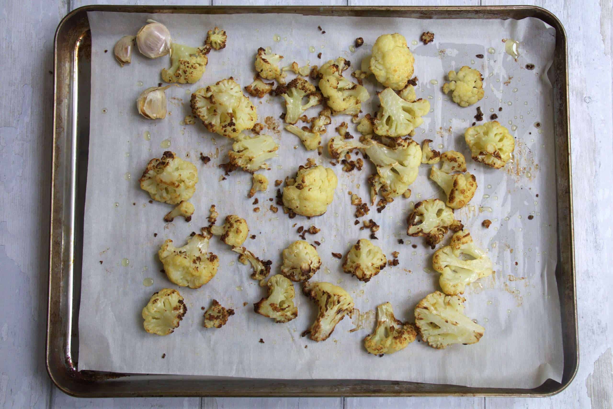 A baking sheet with roasted cauliflower