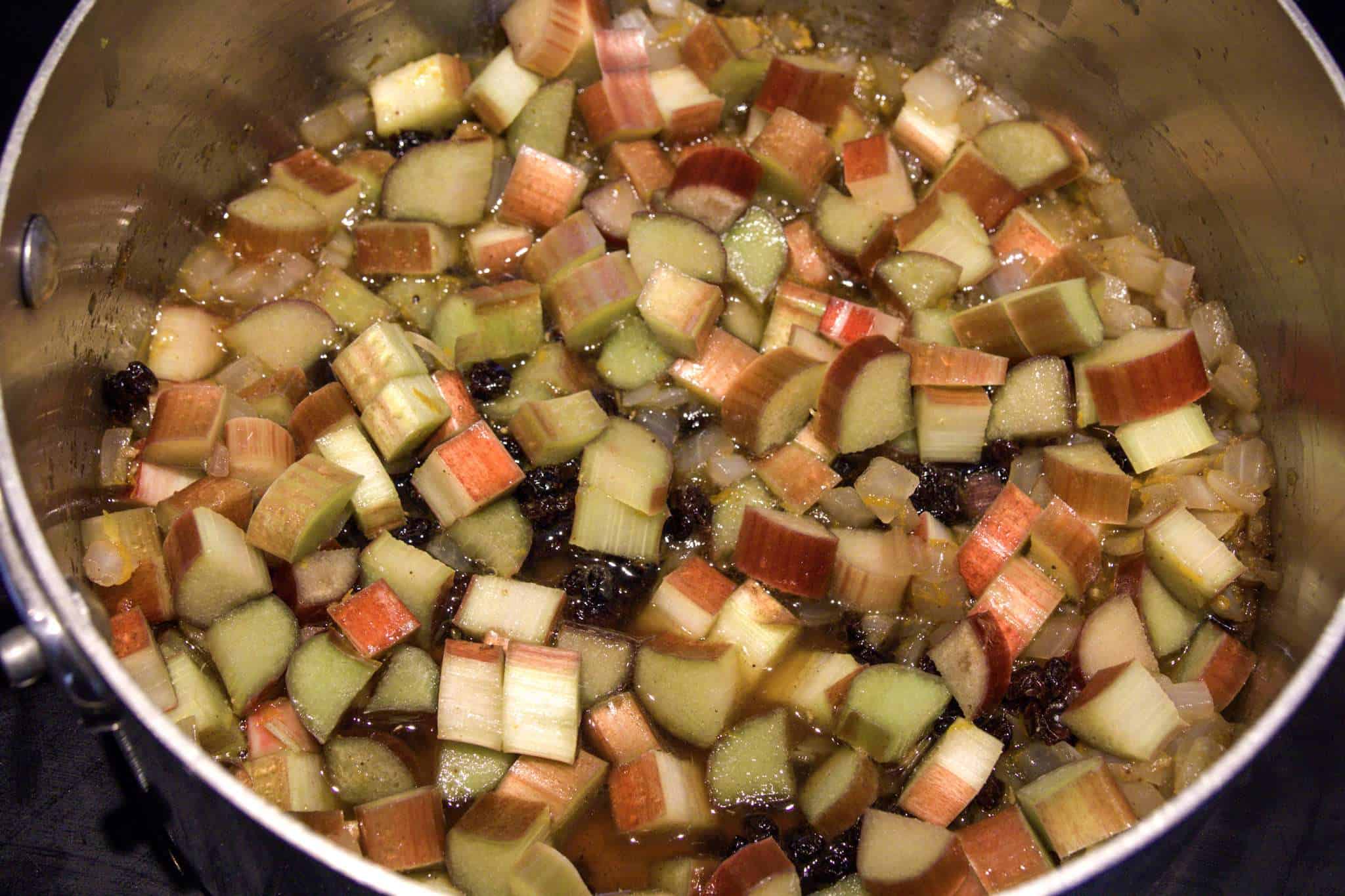 A pot with all the ingredients for rhubarb chutney added and starting to cook
