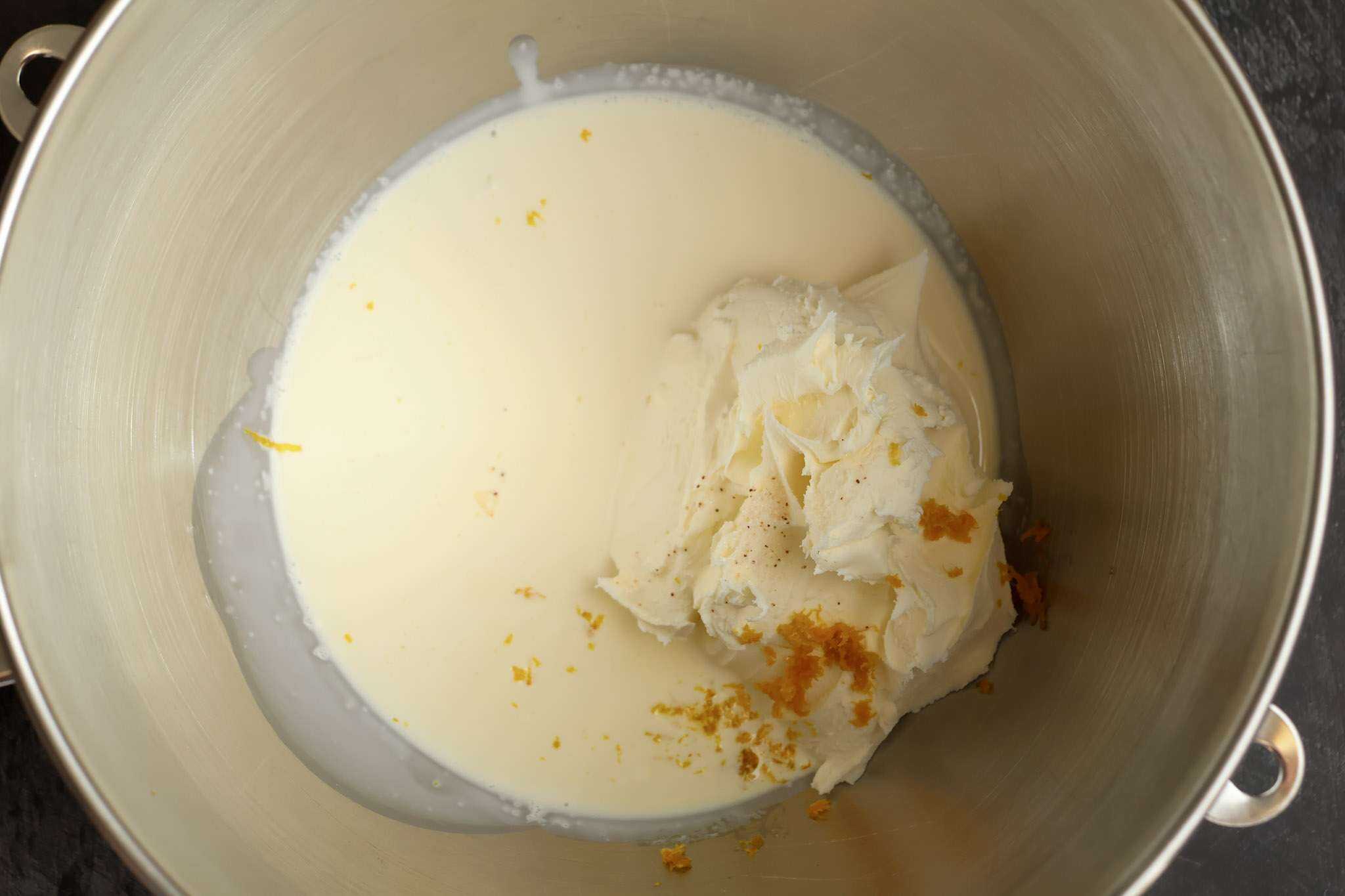 Cream, mascarpone, orange zest and a pinch of salt and in a large mixer bowl, ready to be whipped