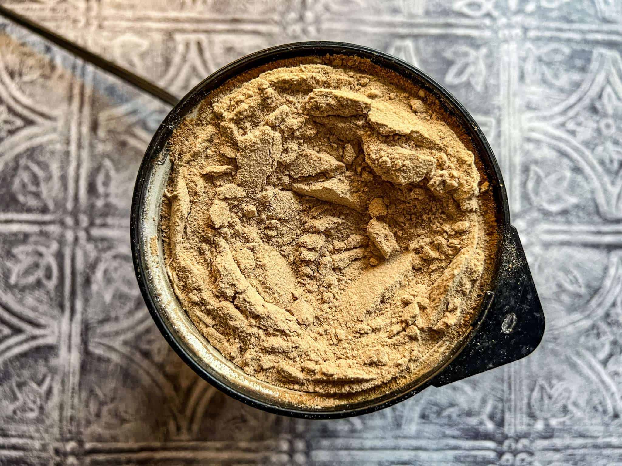 a spice grinder with powdered coconut sugar