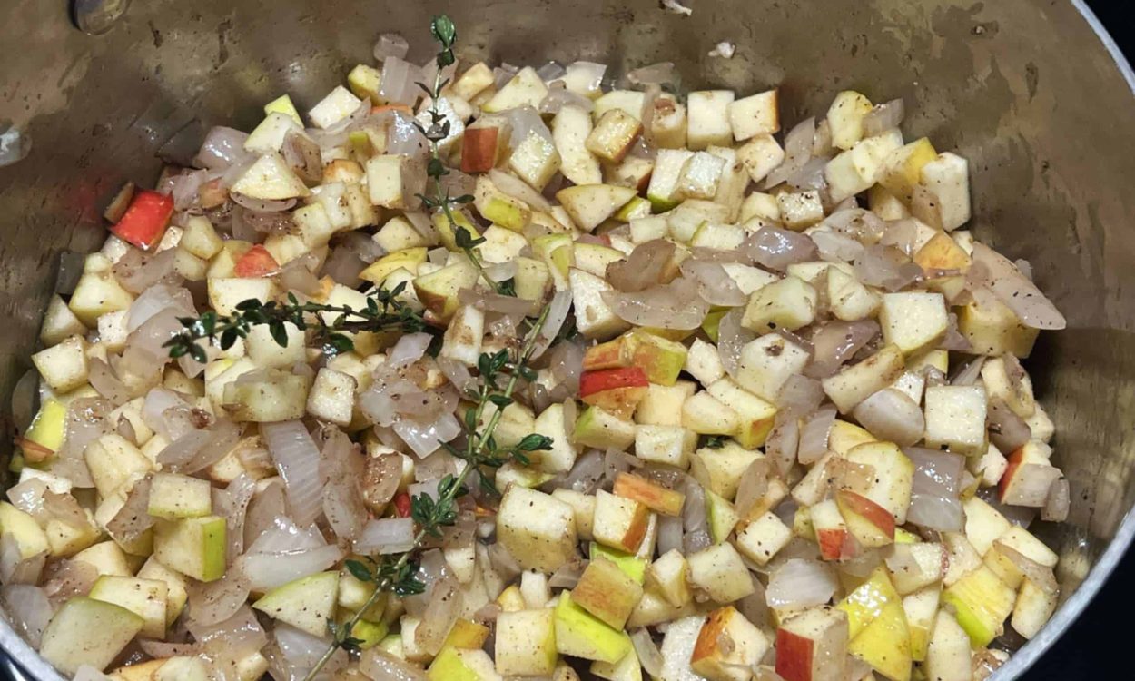 apple chutney ingredients in a pot as they start to cook