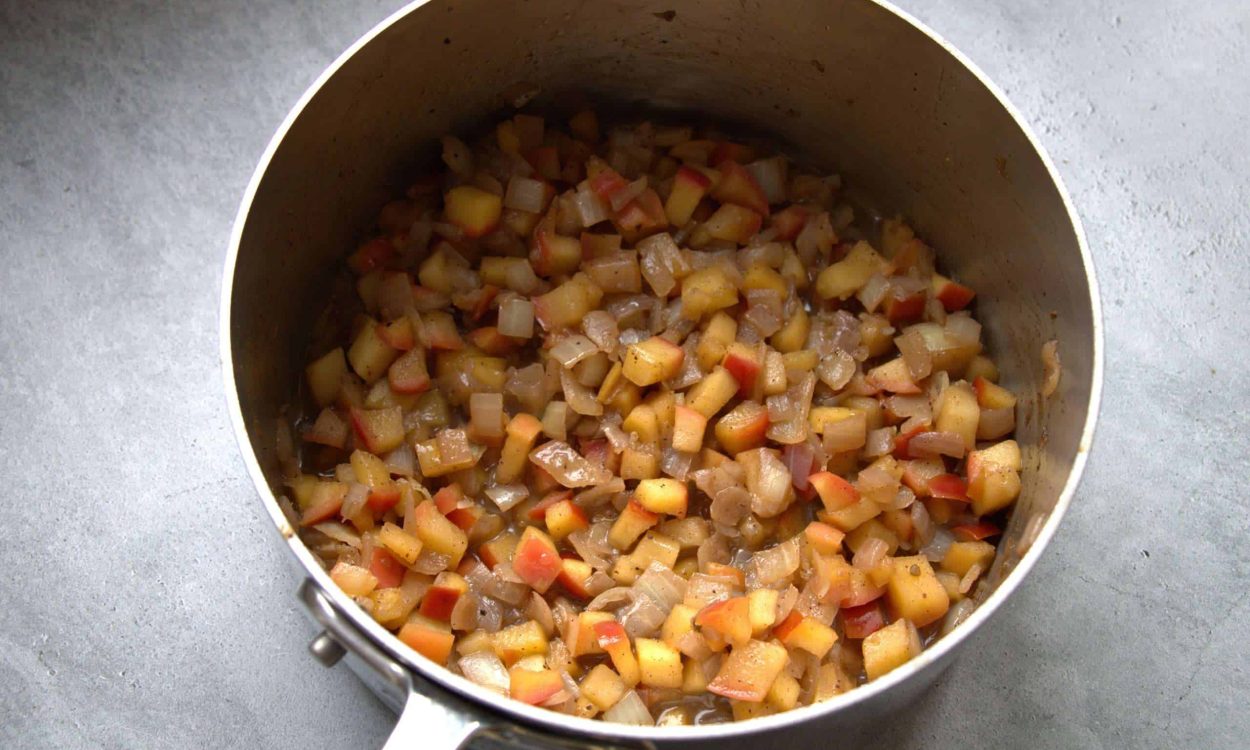 fully cooked apple chutney ingredients in a pot
