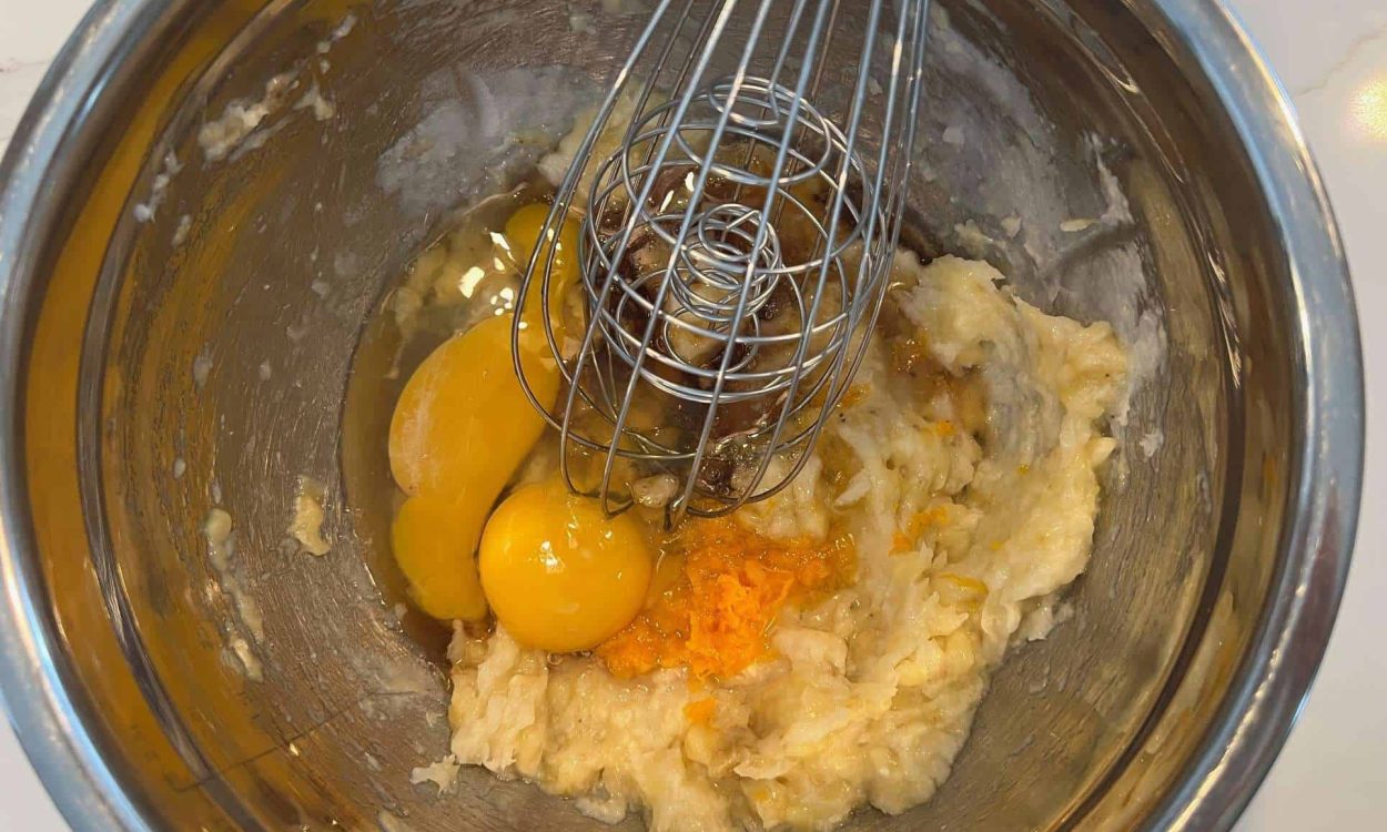 wet ingredients for banana cardamom muffins ready to whisk