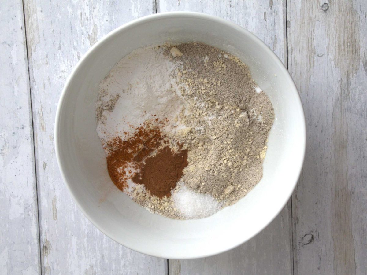 dry ingredients for spiced date chocolate muffins in a bowl