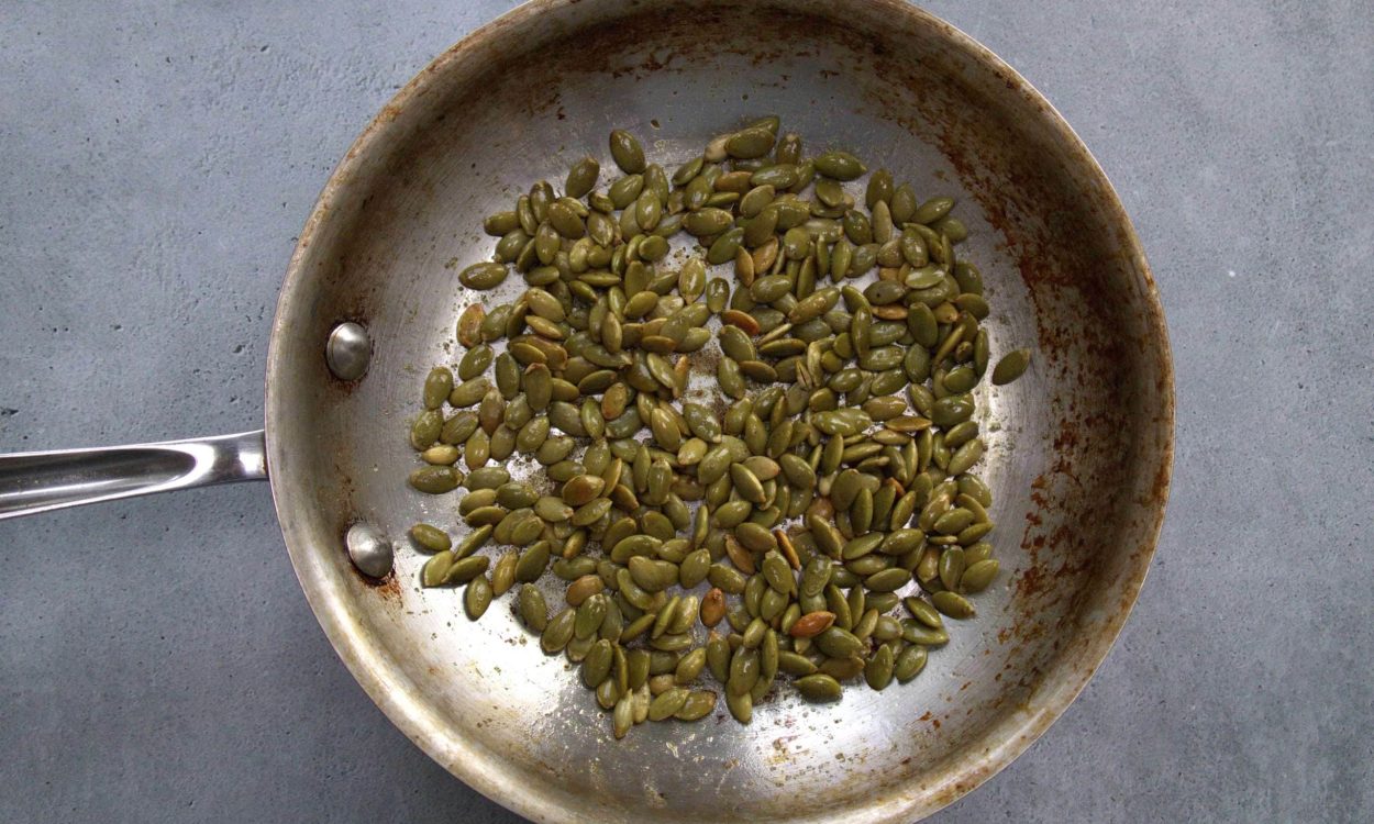 roasted pumpkin seeds in a pan